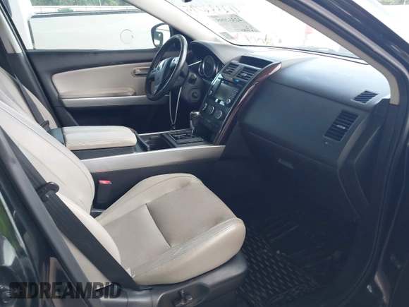 2014 Mazda CX-9 Grand Touring z VIN JM3TB2DA3E0439407, wystawiony jako IAAI lot #42332095 z przebiegiem 108 333 mil mil oraz . Historia ofert i sprzedaży dostępna na DreamBid. Obrazek 5.