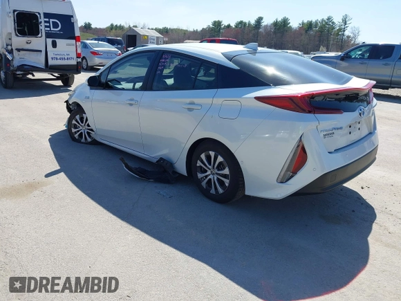 2021 Toyota Prius LE with VIN JTDKAMFP8M3174629, listed as a IAAI auction lot 42087974 with 16,348 mi miles and . Bid and sale history available at DreamBid. Image 3.