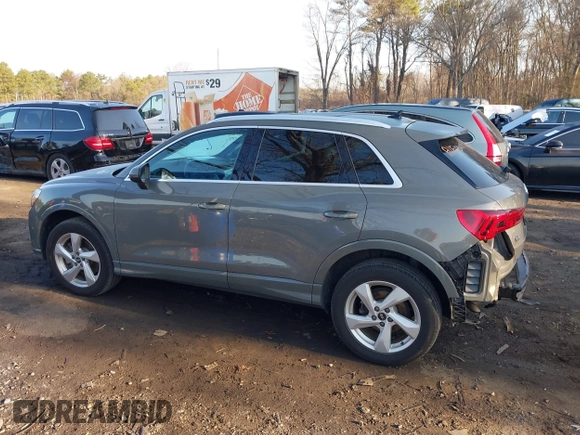 2021 Audi Q3 Premium with VIN WA1AUCF34M1099668, listed as a IAAI auction lot 41990226 with 69,866 mi miles and . Bid and sale history available at DreamBid. Image 14.