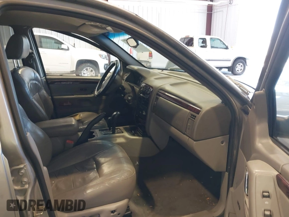 2001 Jeep Grand Cherokee Limited with VIN 1J4GW58S01C566671, listed as a IAAI auction lot 42193545 with 204,887 mi miles and . Bid and sale history available at DreamBid. Image 5.