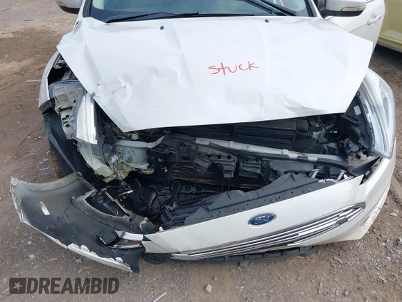 2015 Ford Focus Titanium with VIN 1FADP3N22FL365477, listed as a IAAI auction lot 37461727 with Not provided miles and . Bid and sale history available at DreamBid. Image 6.
