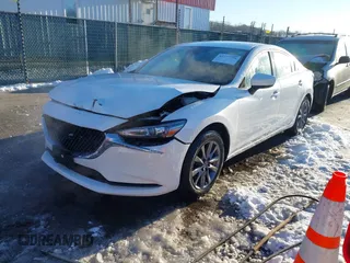 2021 Mazda 6 Sport with VIN JM1GL1UM8M1612598, listed as a IAAI auction lot 41277726 with 19,415 mi miles and . Bid and sale history available at carsss.com. Image 2.