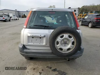 2001 Honda CR-V LX z VIN JHLRD28451S018453, wystawiony jako Copart lot #50223485 z przebiegiem 143 894 mil mil oraz Szkoda całkowita • Salvage title. Historia ofert i sprzedaży dostępna na DreamBid. Obrazek 6.