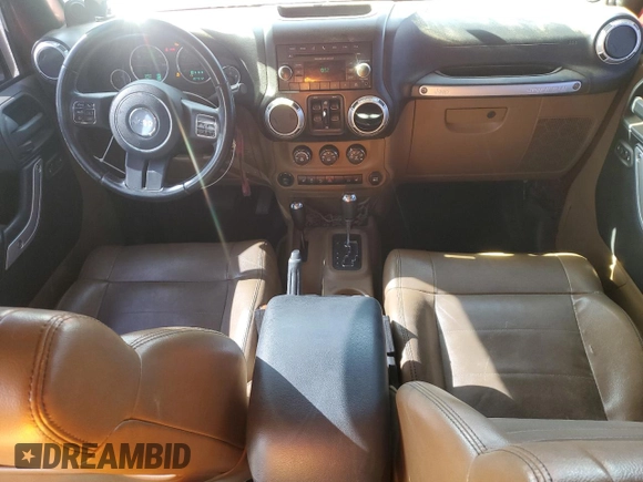 2012 Jeep Wrangler Unlimited Rubicon с VIN 1C4HJWFG6CL109735, выставлен на аукционе Copart как лот 50201085 с пробегом 107 312 миль миль и Списание • Salvage title. История ставок и продаж доступна на DreamBid. Изображение 8.