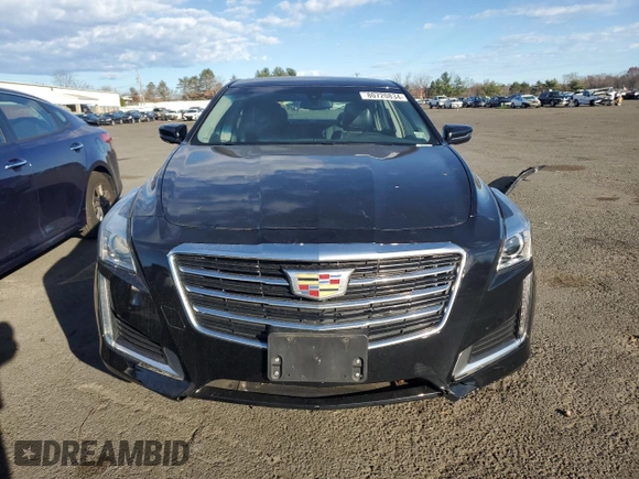 2016 Cadillac CTS AWD с VIN 1G6AW5SX2G0147671, выставлен на аукционе Copart как лот 80720834 с пробегом 57 525 миль миль и Списание • Salvage title. История ставок и продаж доступна на DreamBid. Изображение 5.