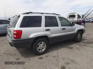 2004 Jeep Grand Cherokee Laredo with VIN 1J4GW48S34C339876, listed as a Copart auction lot 52428045 with 229,606 mi miles and Salvage Title. Bid and sale history available at carsss.com. Image 3.