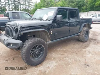 2021 Jeep Gladiator Sport S with VIN 1C6JJTAM7ML554412, listed as a IAAI auction lot 42199167 with 74,263 mi miles and . Bid and sale history available at DreamBid. Image 17.