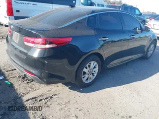 2017 Kia Optima LX with VIN 5XXGT4L30HG152700, listed as a IAAI auction lot 41826259 with 143,438 mi miles. Bid and sale history available at carsss.com. Image 4.