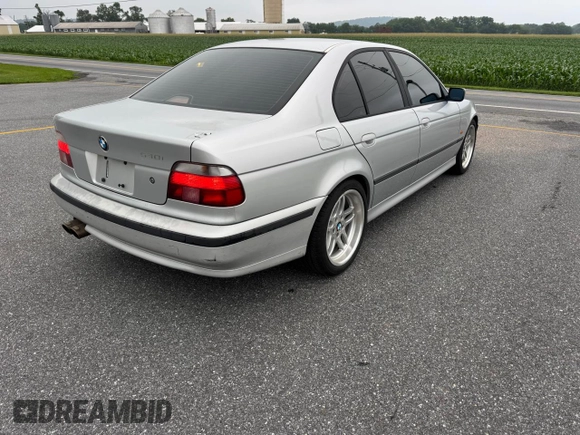 1999 BMW 5 Series 540i z VIN WBADN5333XGC91598, wystawiony jako Copart lot #61690655 z przebiegiem 174 320 mil mil oraz Szkoda całkowita • Salvage title. Historia ofert i sprzedaży dostępna na DreamBid. Obrazek 4.