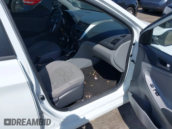 2015 Hyundai Accent GLS with VIN KMHCT4AE0FU896593, listed as a IAAI auction lot 42081643 with 175,346 mi miles and . Bid and sale history available at DreamBid. Image 5.