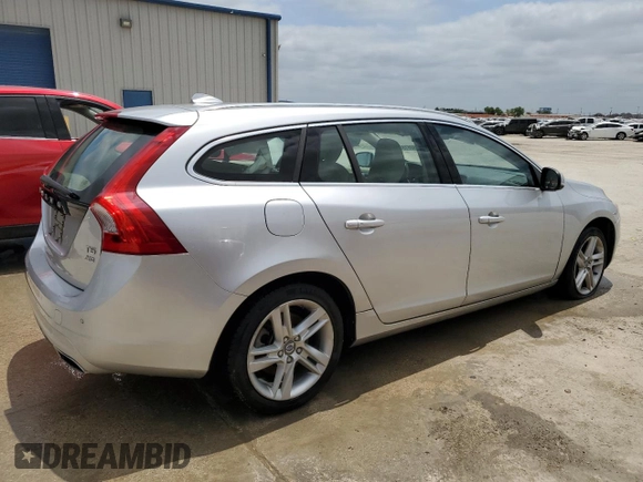 2015 Volvo V60 z VIN YV1612SC1F1191466, wystawiony jako Copart lot #64906184 z przebiegiem 89 444 mil mil oraz Szkoda całkowita • Salvage title. Historia ofert i sprzedaży dostępna na DreamBid. Obrazek 3.