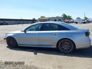 2013 Audi A6 Prestige z VIN WAUJGAFC2DN088630, wystawiony jako IAAI lot #42272569 z przebiegiem 110 324 mil mil oraz . Historia ofert i sprzedaży dostępna na DreamBid. Obrazek 15.