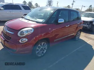 2014 FIAT 500L Lounge with VIN ZFBCFACH1EZ022517, listed as a IAAI auction lot 41783768 with 100,797 mi miles and . Bid and sale history available at DreamBid. Image 2.