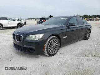 2015 BMW 7 Series 740i with VIN WBAYA6C50FD826727, listed as a Copart auction lot 82197433 with 241,799 mi miles and . Bid and sale history available at DreamBid. Image 1.