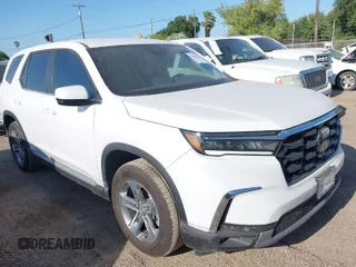2025 Honda Pilot EX-L z VIN 5FNYG2H4XSB008080, wystawiony jako IAAI lot #42002354 z przebiegiem 4 760 mil mil oraz . Historia ofert i sprzedaży dostępna na DreamBid. Obrazek 1.