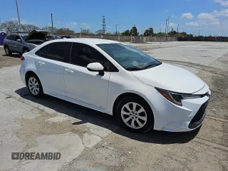 2022 Toyota Corolla LE with VIN 5YFEPMAE2NP388171, listed as a Copart auction lot 52139875 with 56,865 mi miles and Clean Title. Bid and sale history available at DreamBid. Image 4.