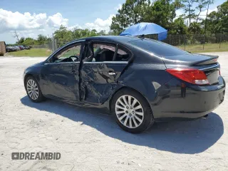2013 Buick Regal Turbo Premium 1 z VIN 2G4GS5EV3D9221173, wystawiony jako Copart lot #61904305 z przebiegiem 144 600 mil mil oraz Szkoda całkowita • Salvage title. Historia ofert i sprzedaży dostępna na DreamBid. Obrazek 2.