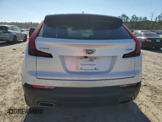 2023 Cadillac XT4 FWD Luxury z VIN 1GYAZAR43PF122536, wystawiony jako Copart lot #88353525 z przebiegiem 67 775 mil mil oraz Szkoda całkowita • Salvage title. Historia ofert i sprzedaży dostępna na DreamBid. Obrazek 6.