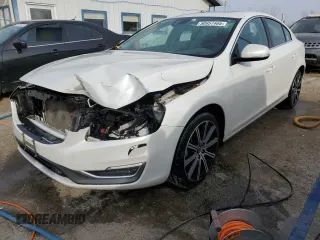 2014 Volvo S60 T5 with VIN YV1612FS9E1282128, listed as a Copart auction lot 50957465 with 86,447 mi miles and Salvage Title. Bid and sale history available at carsss.com. Image 1.