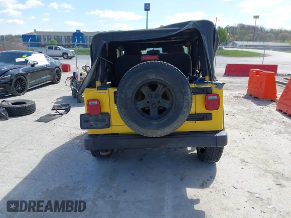2004 Jeep Wrangler Sport with VIN 1J4FA49S64P759360, listed as a IAAI auction lot 42028277 with 176,880 mi miles and . Bid and sale history available at DreamBid. Image 17.