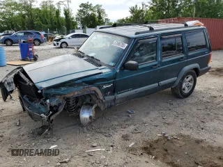1998 Jeep Cherokee Sport z VIN 1J4FJ68S4WL101110, wystawiony jako Copart lot #57696755 z przebiegiem 218 254 mil mil oraz Szkoda całkowita • Salvage title. Historia ofert i sprzedaży dostępna na DreamBid. Obrazek 1.