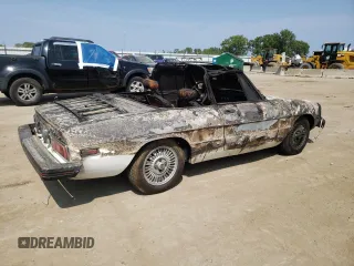 1978 Alfa Romeo Spider z VIN 115410002428, wystawiony jako Copart lot #56698104 z przebiegiem Nie podano mil oraz Szkody całkowita. Historia ofert i sprzedaży dostępna na DreamBid. Obrazek 3.