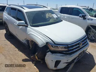 2022 Volkswagen Atlas SE z VIN 1V2JR2CA9NC542633, wystawiony jako IAAI lot #41853622 z przebiegiem 78 261 mil mil oraz . Historia ofert i sprzedaży dostępna na DreamBid. Obrazek 1.