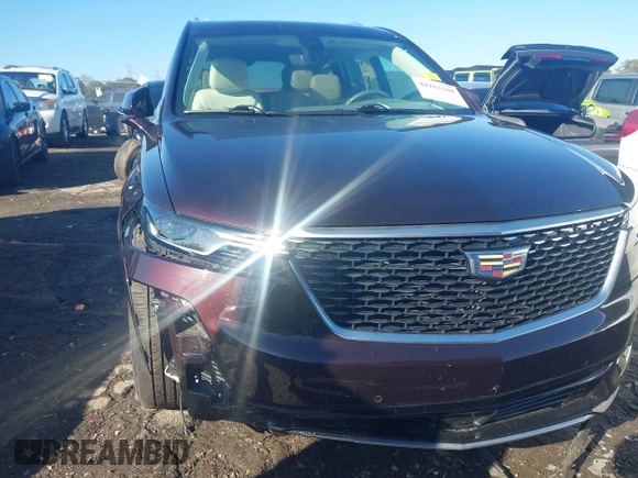 2021 Cadillac XT6 Premium Luxury with VIN 1GYKPDRS7MZ133561, listed as a IAAI auction lot 41112365 with 73,956 mi miles. Bid and sale history available at carsss.com. Image 6.