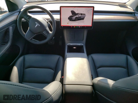 2023 Tesla Model Y Long Range with VIN 7SAYGDEE8PF889879, listed as a Copart auction lot 46115535 with 17,818 mi miles and Salvage Title. Bid and sale history available at DreamBid. Image 8.