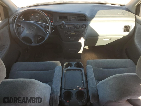 1999 Honda Odyssey EX with VIN 2HKRL1860XH541737, listed as a Copart auction lot 88897965 with 112,164 mi miles and Salvage title. Bid and sale history available at DreamBid. Image 8.