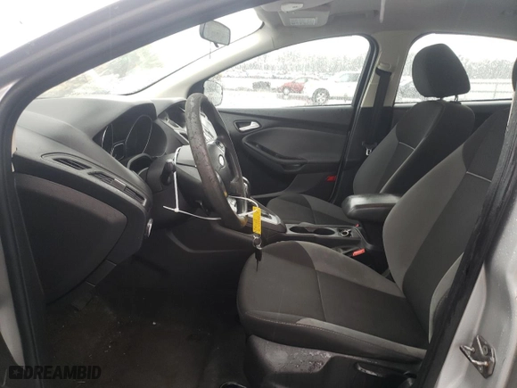 2014 Ford Focus SE with VIN 1FADP3F22EL103956, listed as a Copart auction lot 71005344 with 102,509 mi miles and Salvage Title. Bid and sale history available at carsss.com. Image 7.