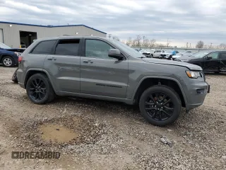 2021 Jeep Grand Cherokee Laredo X with VIN 1C4RJFAG5MC855915, listed as a Copart auction lot 52577035 with 37,253 mi miles and Salvage Title. Bid and sale history available at carsss.com. Image 4.