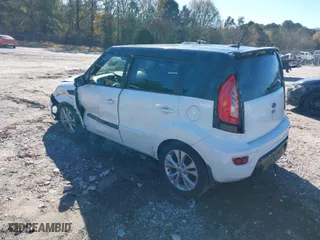 2012 Kia Soul + with VIN KNDJT2A64C7470988, listed as a IAAI auction lot 41082059 with 124,592 mi miles. Bid and sale history available at carsss.com. Image 3.