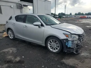 2012 Lexus CT 200h with VIN JTHKD5BH6C2089061, listed as a Copart auction lot 58827705 with 124,474 mi miles and Salvage title. Bid and sale history available at DreamBid. Image 4.