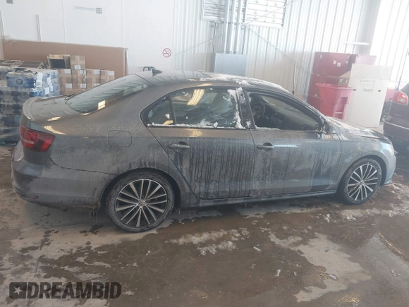 2016 Volkswagen Jetta Sport z VIN 3VWD17AJ9GM250243, wystawiony jako IAAI lot #41618054 z przebiegiem 38 520 mil mil oraz . Historia ofert i sprzedaży dostępna na DreamBid. Obrazek 13.
