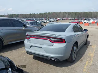 2020 Dodge Charger SXT with VIN 2C3CDXBG9LH232833, listed as a IAAI auction lot 41812035 with 63,391 mi miles. Bid and sale history available at carsss.com. Image 4.