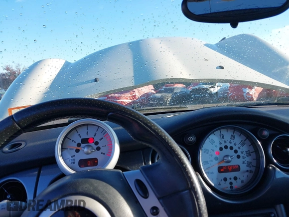2004 MINI Hardtop with VIN WMWRC33464TJ58388, listed as a IAAI auction lot 40827409 with 102,322 mi miles and . Bid and sale history available at DreamBid. Image 7.