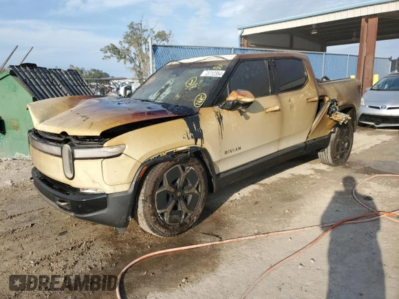2023 Rivian R1T Adventure z VIN 7FCTGBAA6PN028517, wystawiony jako Copart lot #73712354 z przebiegiem Nie podano mil oraz Nie do naprawy. Historia ofert i sprzedaży dostępna na DreamBid. Obrazek 1.