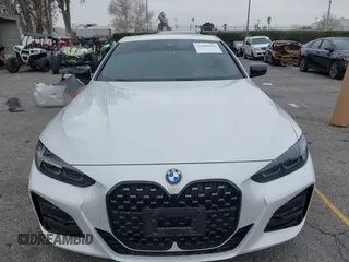 2022 BMW 4 Series 430i with VIN WBA53AP02NCK91287, listed as a IAAI auction lot 41448686 with 27,046 mi miles and . Bid and sale history available at carsss.com. Image 13.