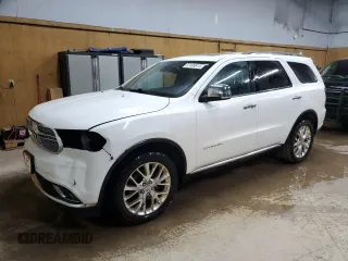 2015 Dodge Durango Citadel z VIN 1C4SDJET6FC770619, wystawiony jako Copart lot #57499815 z przebiegiem 134 278 mil mil oraz Czysty tytuł • Clean title. Historia ofert i sprzedaży dostępna na DreamBid. Obrazek 1.