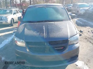 2016 Dodge Grand Caravan SE with VIN 2C4RDGBG1GR357895, listed as a IAAI auction lot 41389733 with 131,175 mi miles and . Bid and sale history available at DreamBid. Image 12.