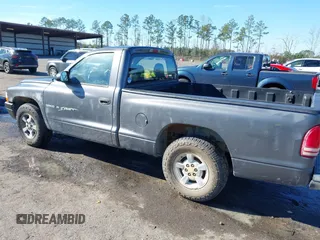 2001 Dodge Dakota with VIN 1B7FL26X91S342103, listed as a IAAI auction lot 41277465 with 157,993 mi miles. Bid and sale history available at carsss.com. Image 3.