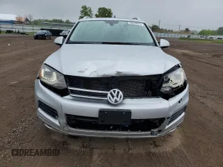 2014 Volkswagen Touareg Sport с VIN WVGEF9BP0ED014429, выставлен на аукционе Copart как лот 58692875 с пробегом 157 417 миль миль и Списание • Salvage title. История ставок и продаж доступна на DreamBid. Изображение 5.