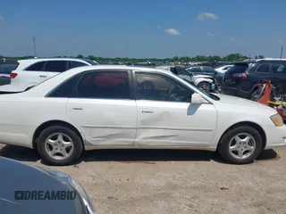 2001 Toyota Avalon XL z VIN 4T1BF28B91U183347, wystawiony jako IAAI lot #42441956 z przebiegiem 310 167 mil mil oraz . Historia ofert i sprzedaży dostępna na DreamBid. Obrazek 13.