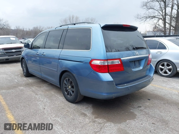 2005 Honda Odyssey TOURING with VIN 5FNRL38815B048075, listed as a IAAI auction lot 41813377 with 259,138 mi miles. Bid and sale history available at carsss.com. Image 3.
