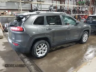 2014 Jeep Cherokee Latitude with VIN 1C4PJMCS0EW213826, listed as a IAAI auction lot 41322537 with 272,659 mi miles and . Bid and sale history available at DreamBid. Image 4.