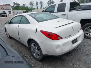2007 Pontiac G6 GT with VIN 1G2ZH361674180268, listed as a IAAI auction lot 42101853 with 77,795 mi miles. Bid and sale history available at carsss.com. Image 3.