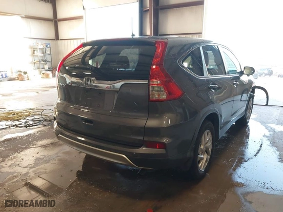 2015 Honda CR-V EX with VIN 3CZRM3H57FG706605, listed as a IAAI auction lot 41233942 with 112,842 mi miles. Bid and sale history available at carsss.com. Image 4.