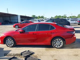 2024 Toyota Camry LE z VIN 4T1C11AK1RU207305, wystawiony jako IAAI lot #41973066 z przebiegiem 19 165 mil mil oraz . Historia ofert i sprzedaży dostępna na DreamBid. Obrazek 14.