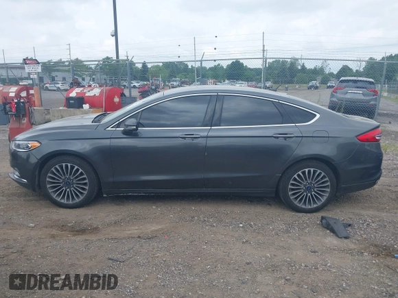 2017 Ford Fusion SE with VIN 3FA6P0T9XHR186017, listed as a IAAI auction lot 42535725 with 166,794 mi miles and . Bid and sale history available at DreamBid. Image 14.